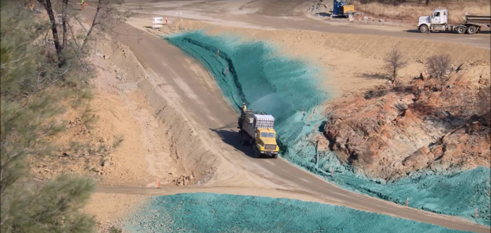 Bonded fiber matrix on cut slope and channel