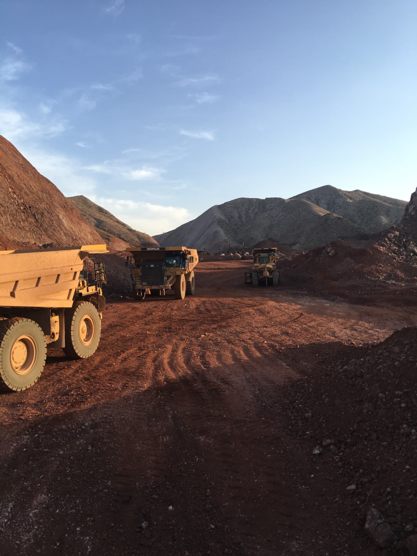 Treated haul road holding under loaded truck traffic