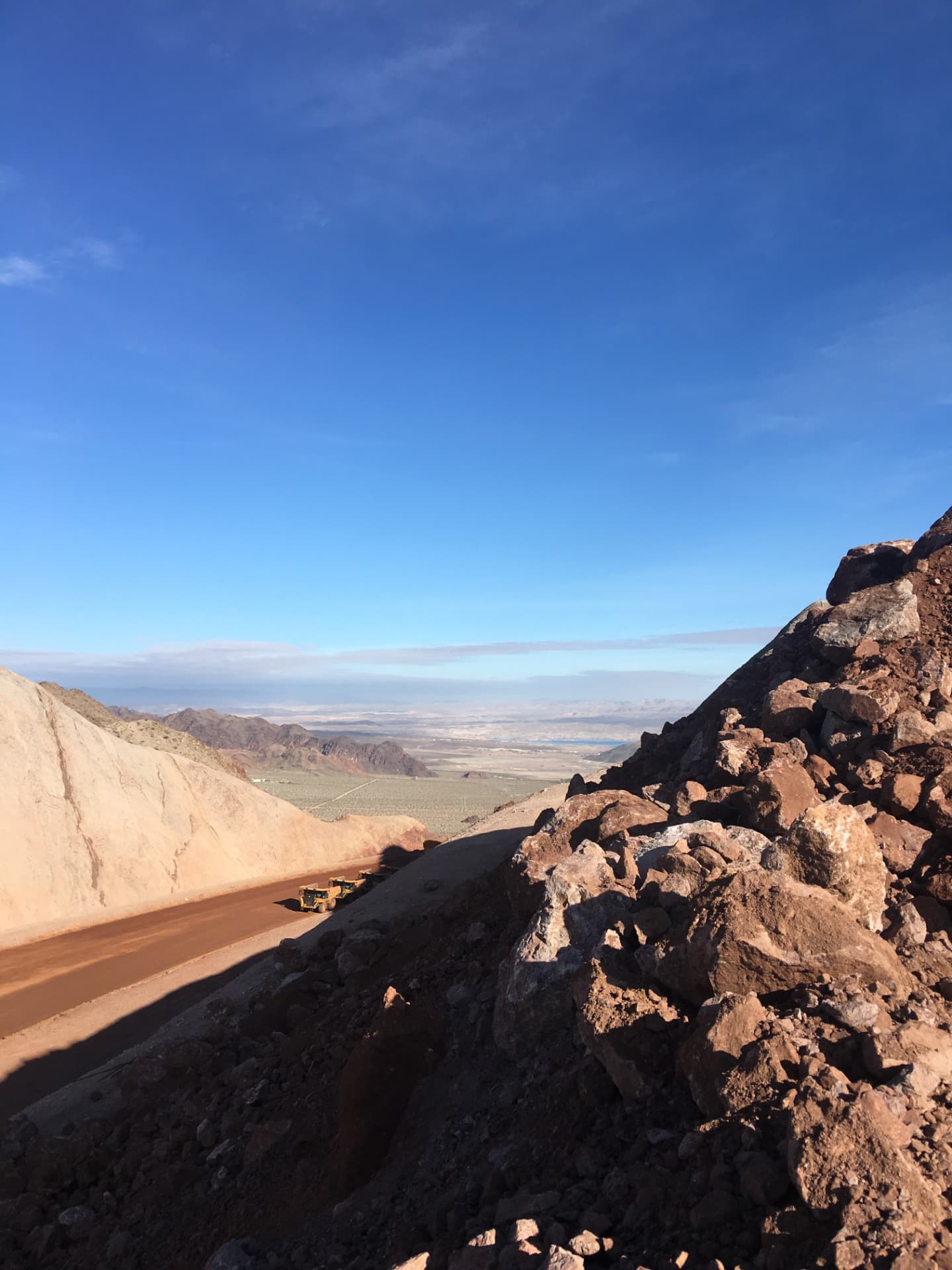 Dust-free haul road descending to the valley floor